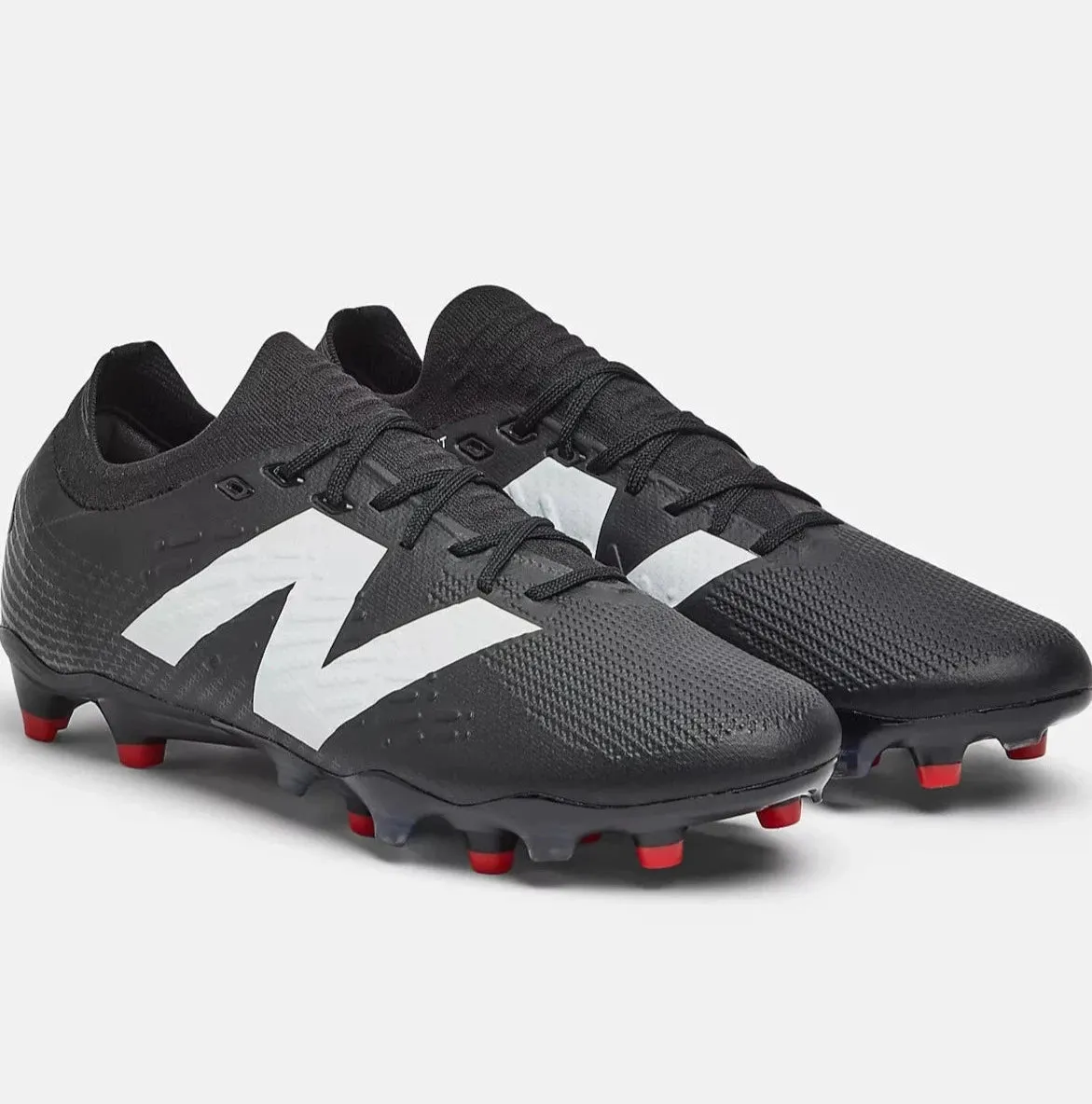 NEW BALANCE TEKELA PRO LOW FG V4  FOOTBALL BOOTS